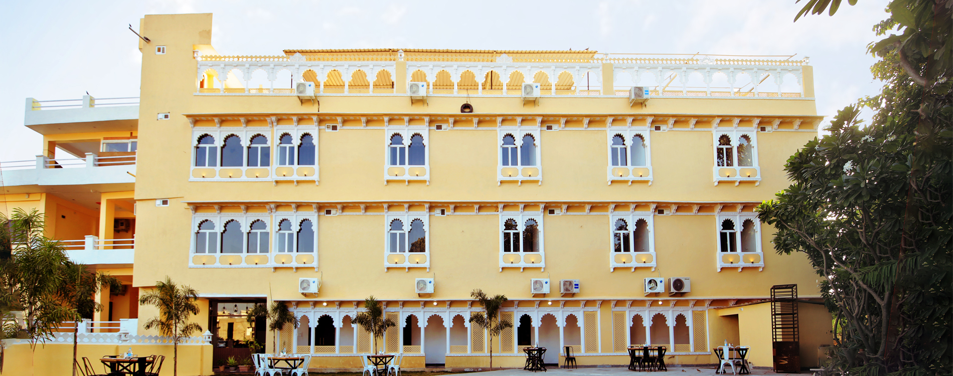 The Kanchangarh Resort Udaipur exterior with scenic Aravalli view